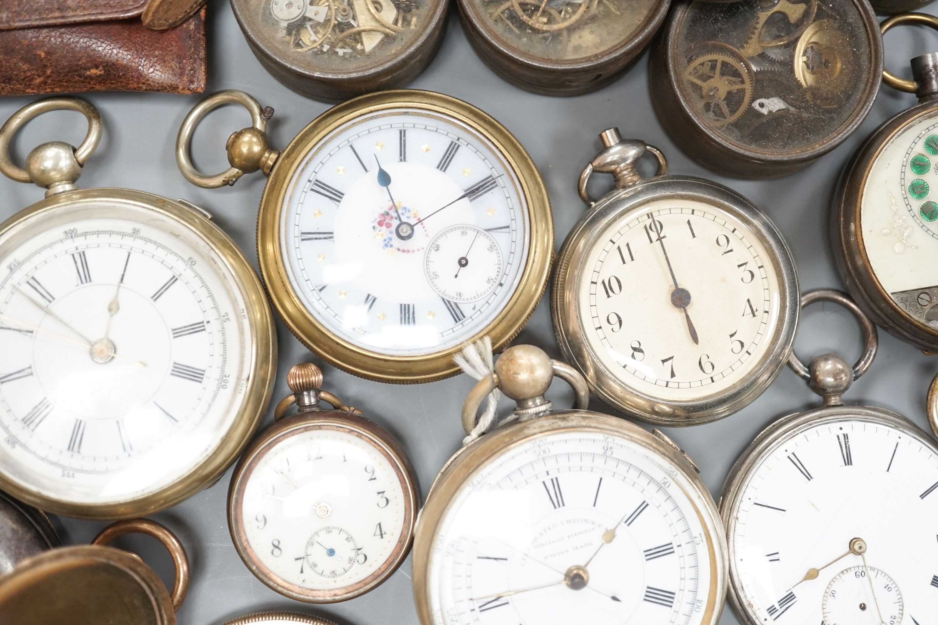 A small collection of assorted base metal and gold plated pocket watches including Hebdomas and Waltham and a small quantity of watch parts.